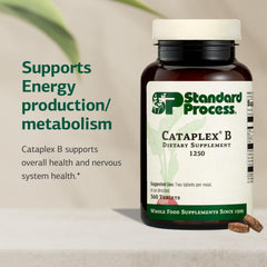 Standard Process Cataplex B capsules on white surface representing easy daily intake.