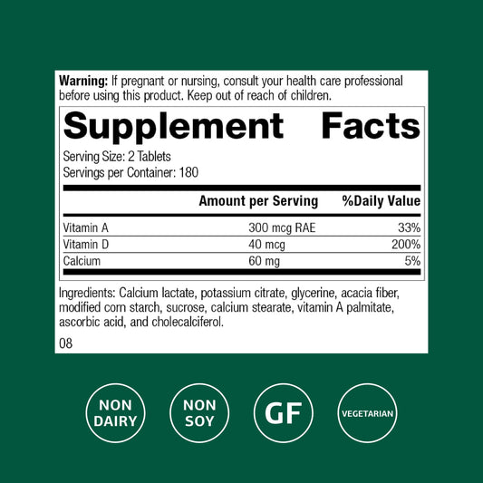 Standard Process Cataplex D tablets arranged on white background for bone health focus.