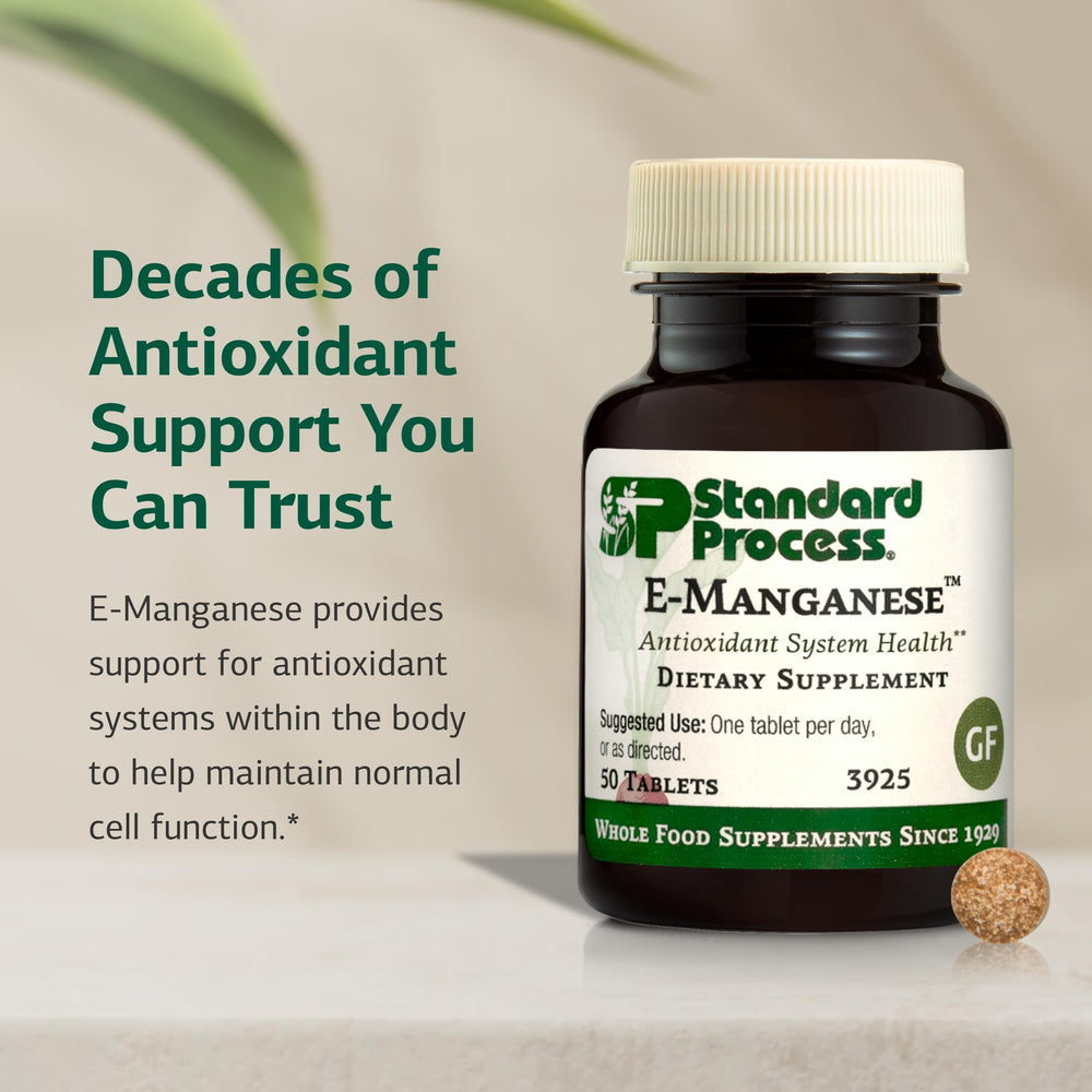 Standard Process E-Manganese tablets arranged for everyday vitality.