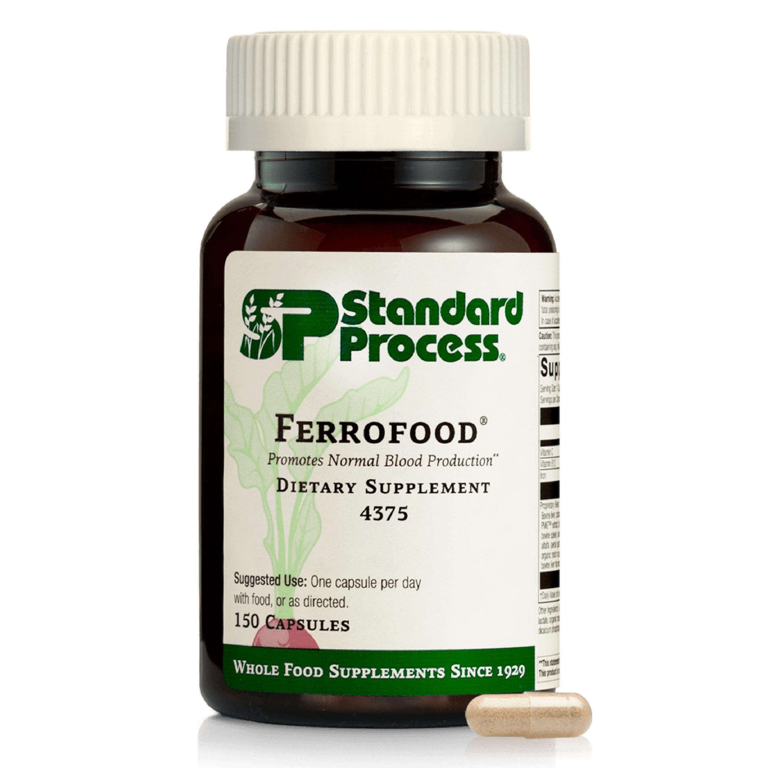 Standard Process Ferrofood bottle on table highlighting iron support for daily blood health.