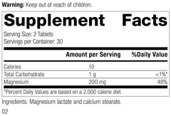 Standard Process Magnesium Lactate tablets arranged for muscle relaxation and bone health.