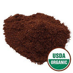 Starwest Botanicals schisandra berry powder poured into a bowl for smoothies.