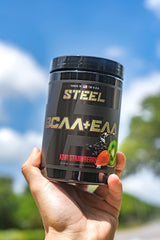 Steel Supplements BCAA EAA powder label closeup highlights 2:1:1 ratio and kiwi-strawberry flavor