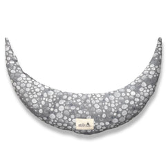 Stillnus Crescent Moon Pillow in grey dots offers neck support with lavender aromatherapy.
