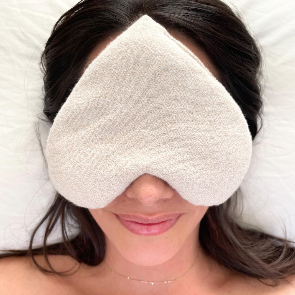 Stillnus handmade cotton cover with visible stitching for comfortable skin contact.