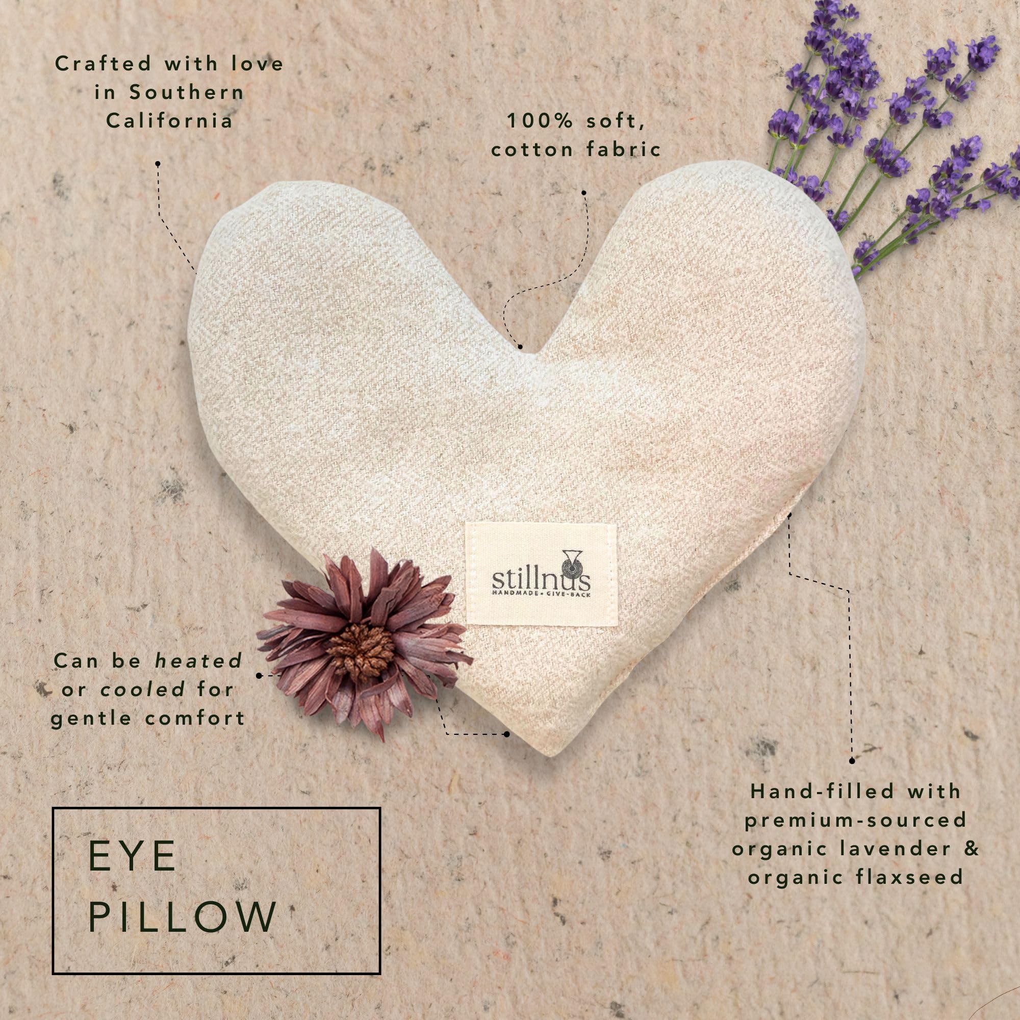 Stillnus lavender-filled heart pillow interior visible, emphasizing organic flaxseed for gentle warmth.