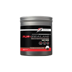 Strength Genesis Pur Zealander whey chocolate tub closeup showing rich powder.