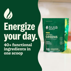 Suja Organic Greens Powder bottle dispensing, convenient daily supplement for digestion and immune support.