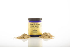 Sun Potion reishi powder dispensing scoop ready for daily dosing.