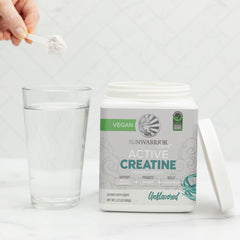 Sunwarrior Creatine Monohydrate powder mixed in shaker for performance support.
