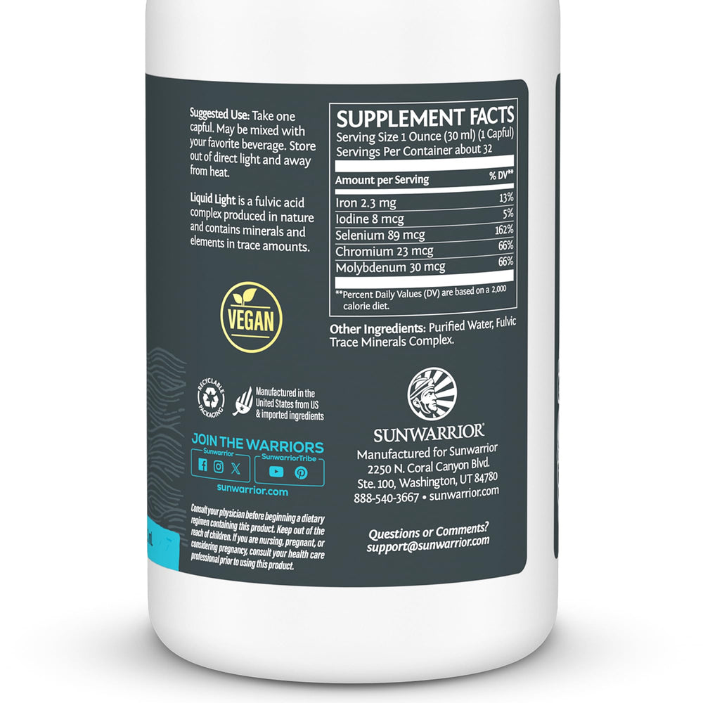 Sunwarrior Fulvic Acid Drops poured into water for electrolyte support.