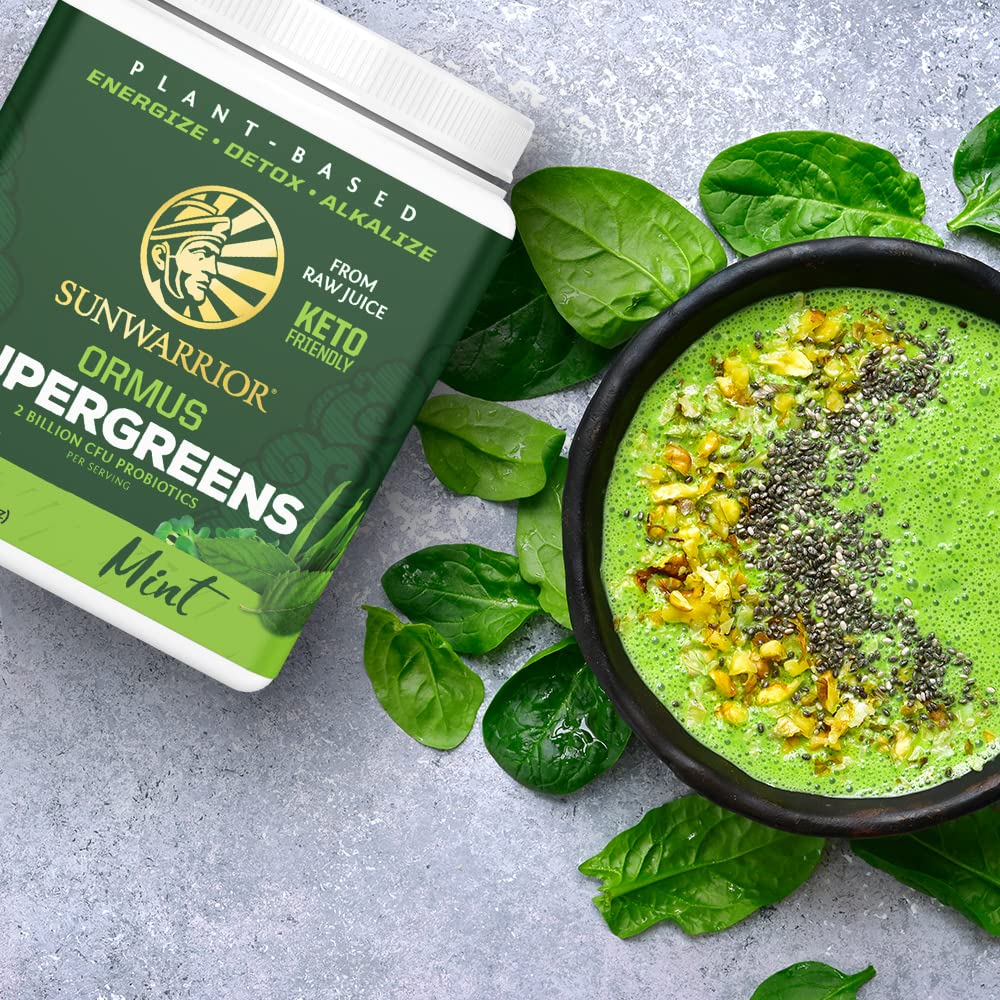 Sunwarrior organic label close-up emphasizes raw vegan non-GMO quality.