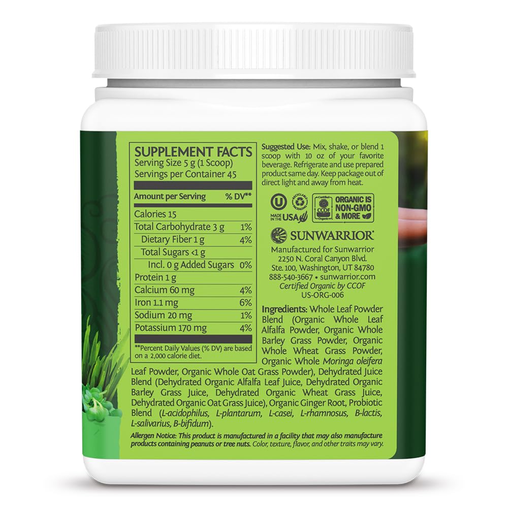Sunwarrior Ormus Greens scoop in glass for quick smoothie mix.