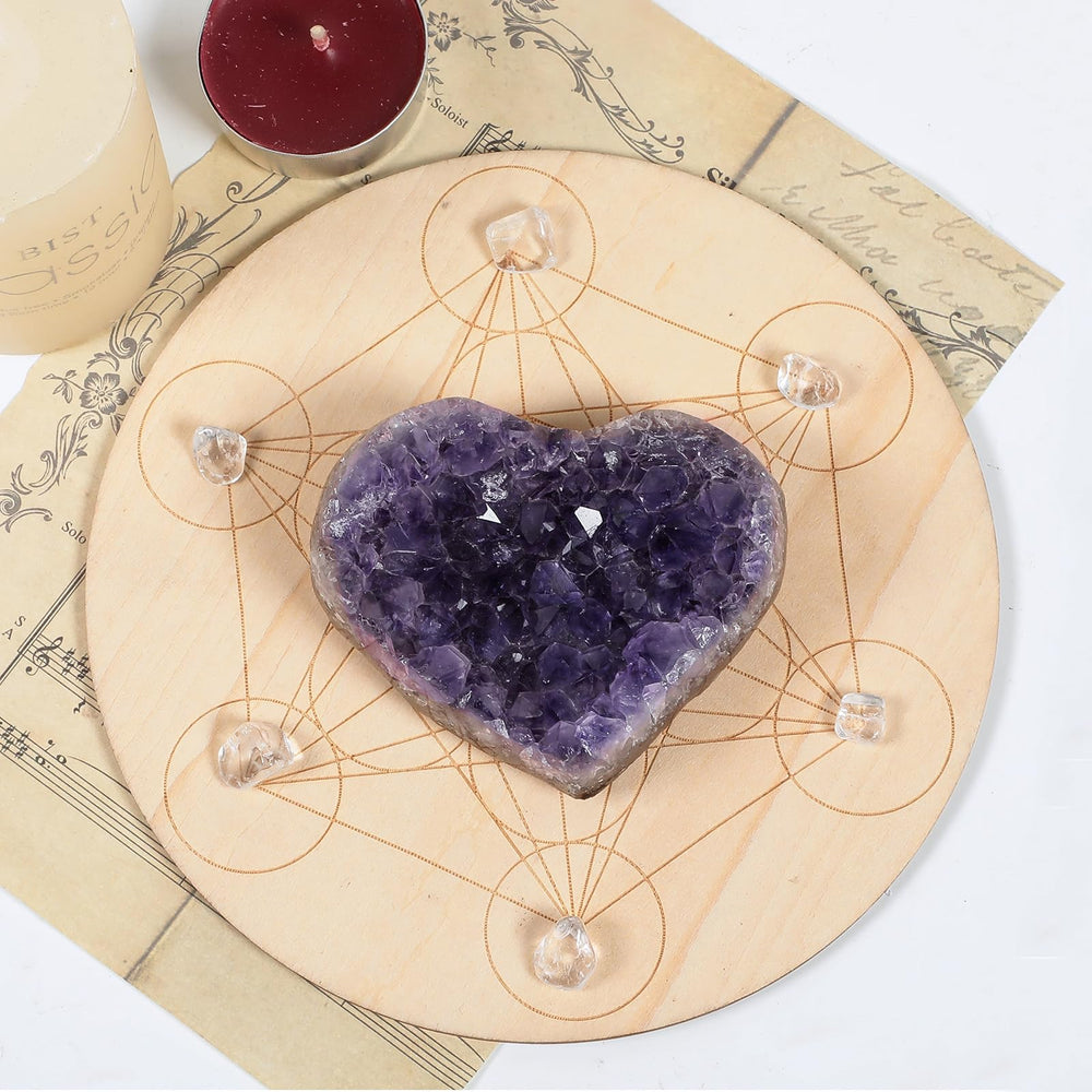 SUNYIK geode amethyst cluster highlights sparkle on display surfaces.