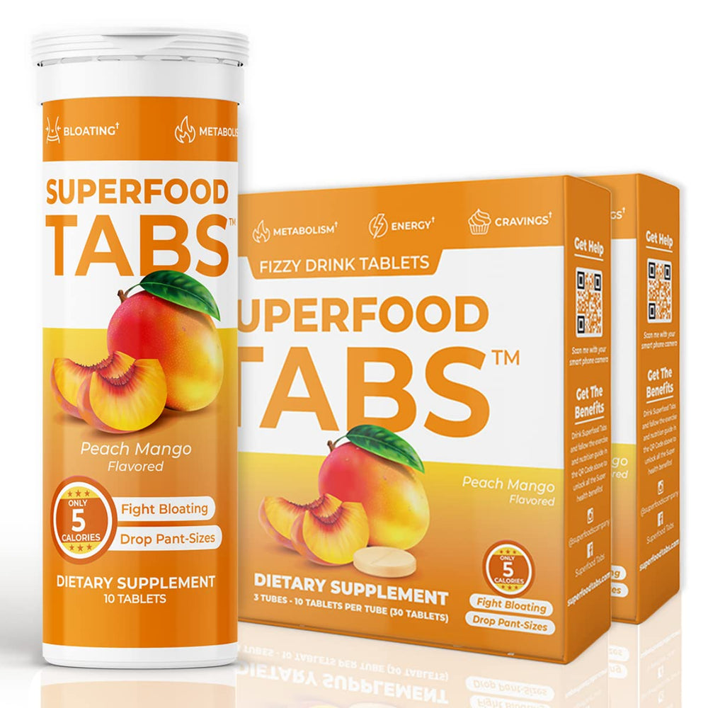 Superfood Tabs Peach Mango effervescent tab dissolving in water for digestion and energy support.