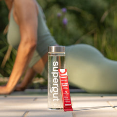 Supergut GLP-1 Daily Support served over ice in a glass.