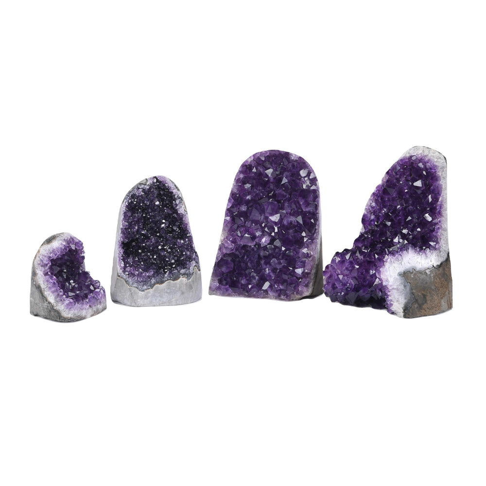 SUPERIOR Amethyst cluster shown against warm wood background for cozy decor