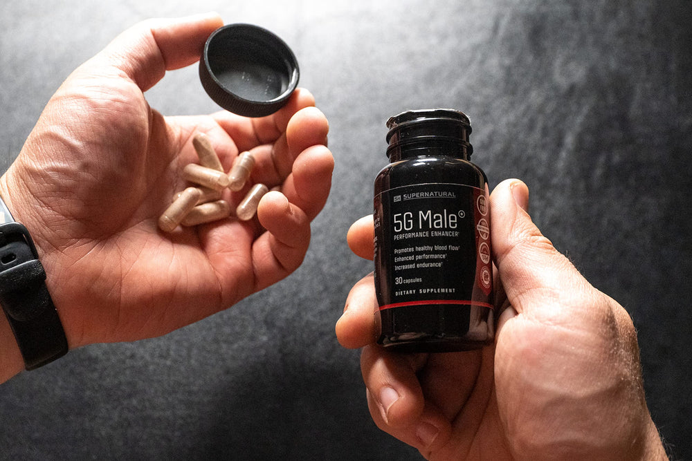 Supernatural Man 5G Male packaging on desk, ready for daily use.