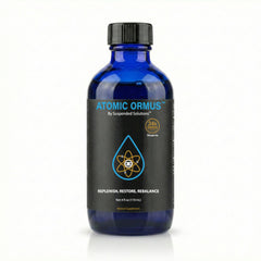 Suspended Solutions Liquid ORMUS vial in use during meditation, hinting at energy and focus.