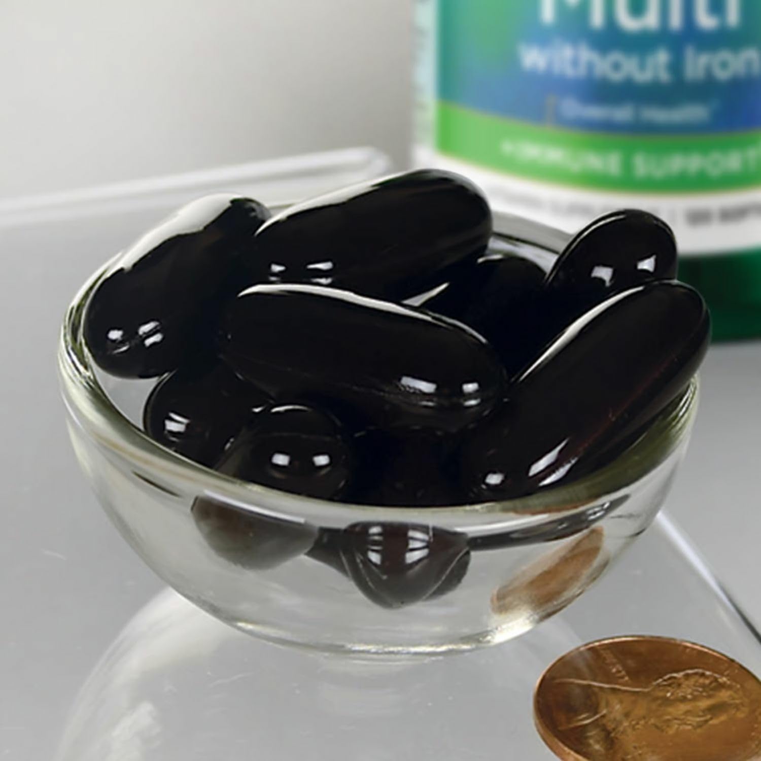 Swanson Multi Without Iron softgels pile shows convenient iron-free capsules