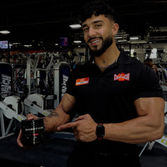 Athlete mixing SweetCre Creatine Monohydrate after training for endurance support.