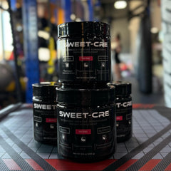 SweetCre Creatine Monohydrate powder near fruit pieces to emphasize flavor.