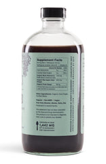 Sweet's Elderberry Shrub being poured into a glass for a refreshing mixer