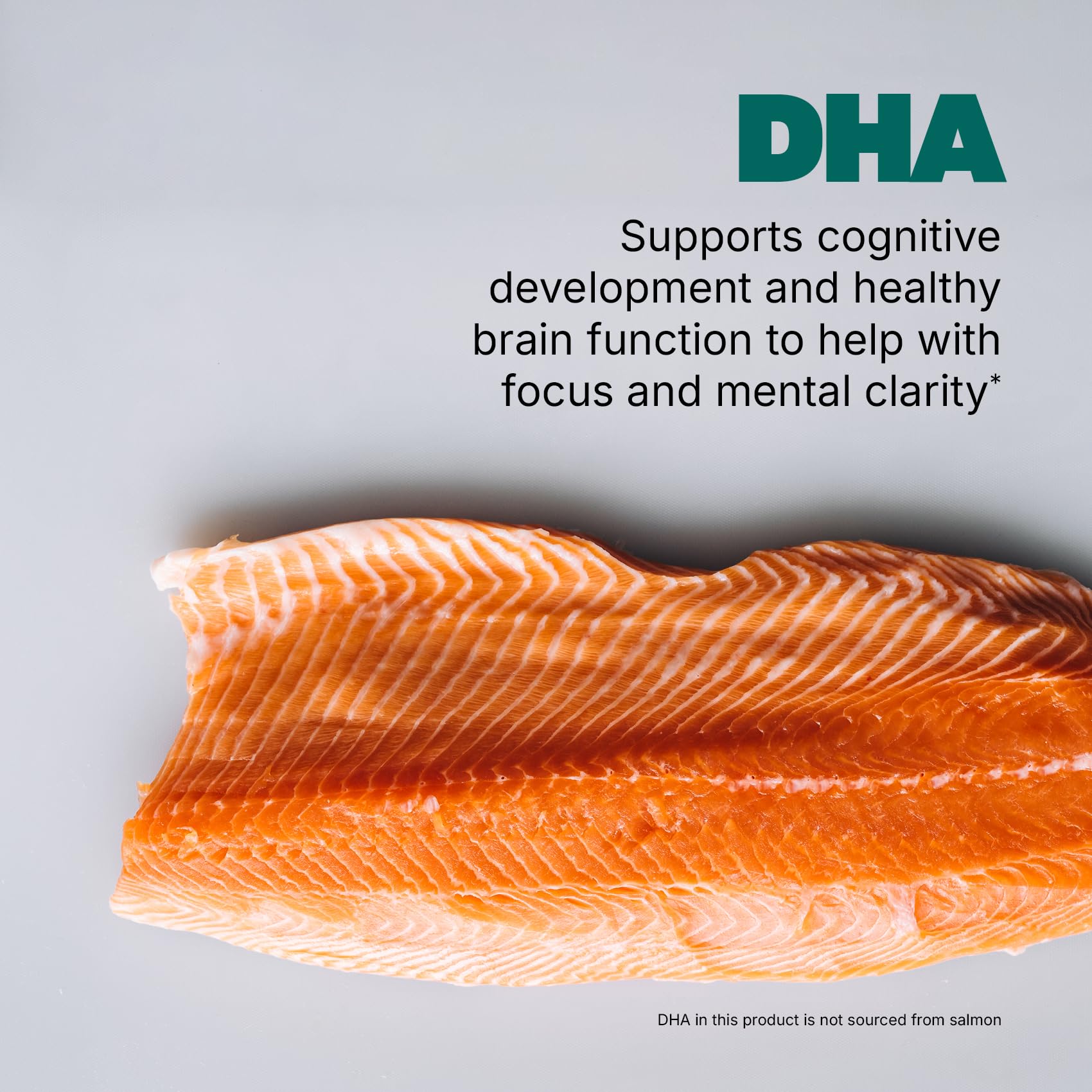 Swisse PQQ-DHA Brain Booster held by hand, signaling easy daily use.