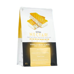 Syntrax Nectar Sweets Vanilla Bean Torte scoop beside bottle illustrating instant mixability in water.