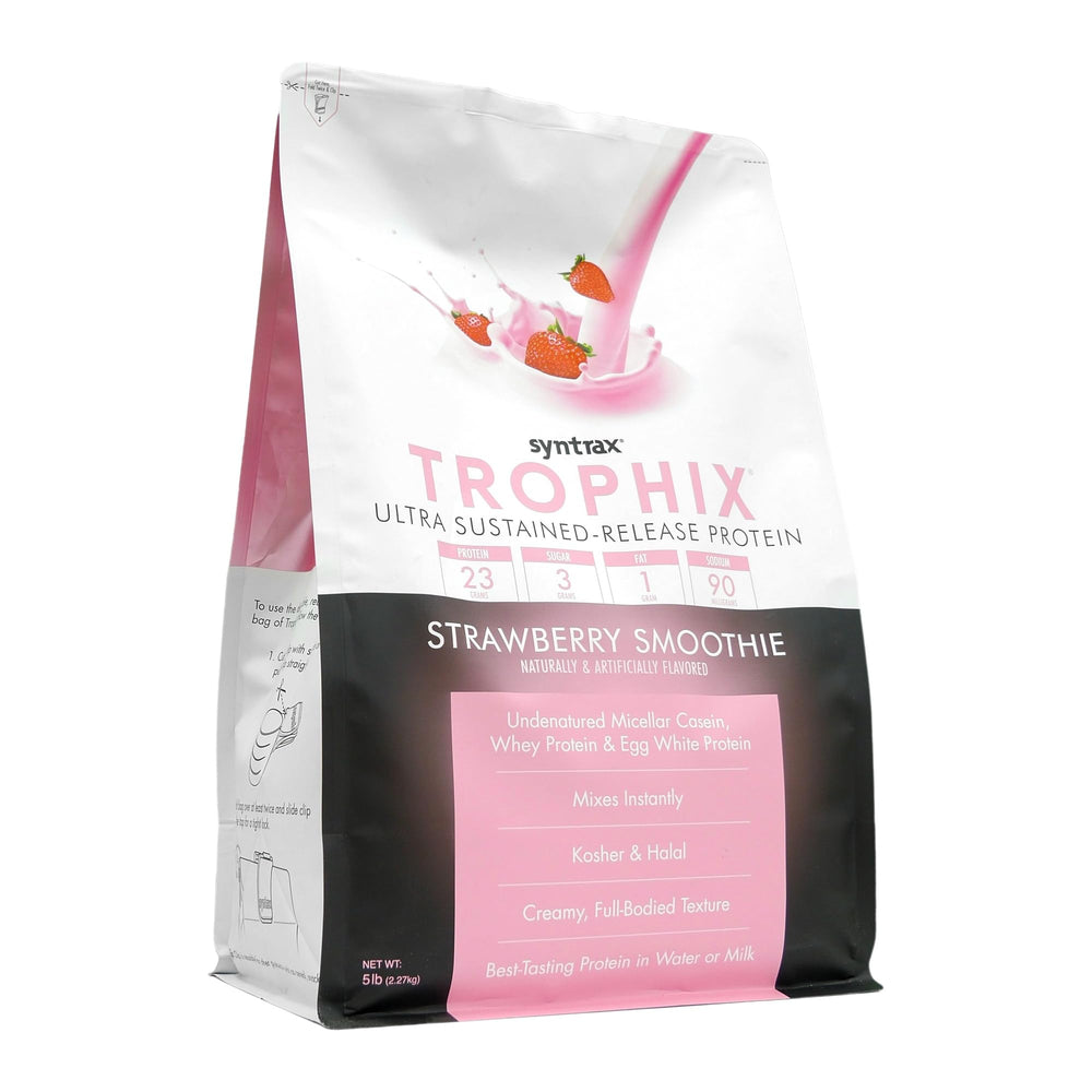 Syntrax Trophix scoop beside tub for precise protein portions