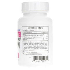 DReM capsules beside water glass for easy nightly intake.