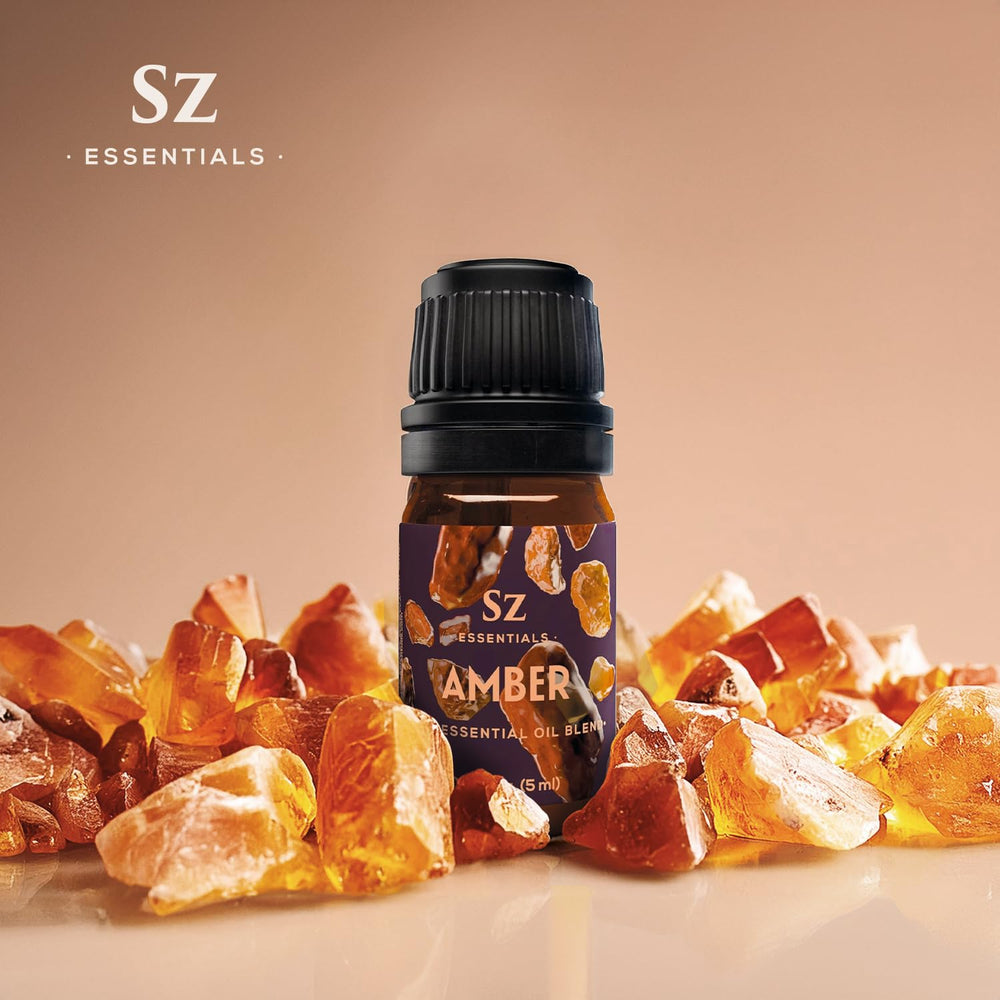 Sz Essentials Amber Oil aromatherapy in cozy nighttime ambiance.