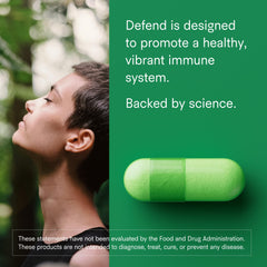 Close-up of the Defend label highlighting vegan, non-GMO formula