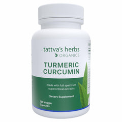 Tattva's Herbs Turmeric Curcumin bottle on table for daily antioxidant support.