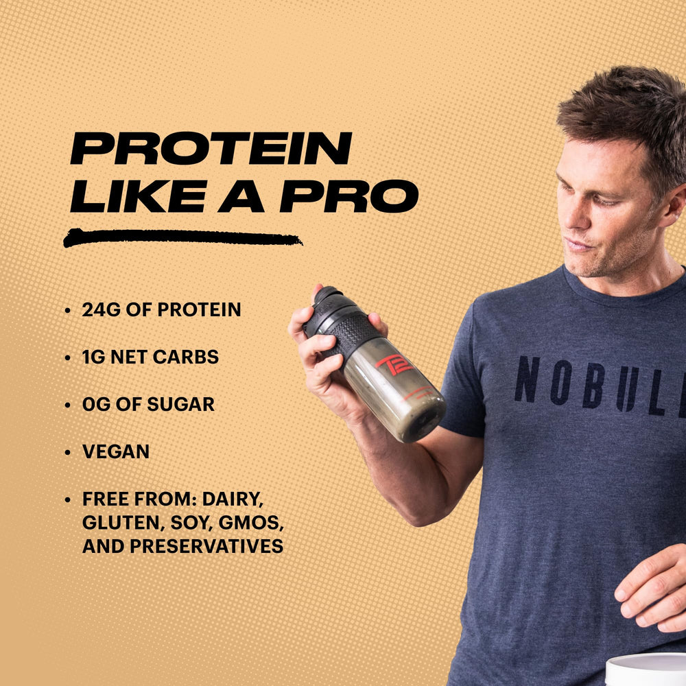 TB12 measuring scoop beside vanilla protein powder for easy prep