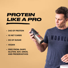 TB12 measuring scoop beside vanilla protein powder for easy prep