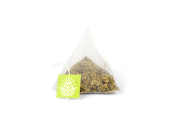 Tea Botanics Night Sweat Tea on a nightstand, ready for a relaxing ritual.