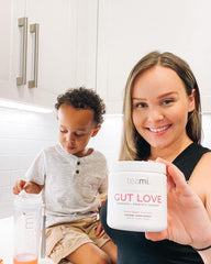 Teami Gut Love packaging on a clean kitchen counter.