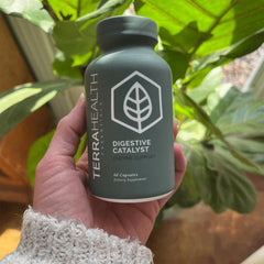 Terra Health Essentials Digestive Catalyst in-use bottle on kitchen counter