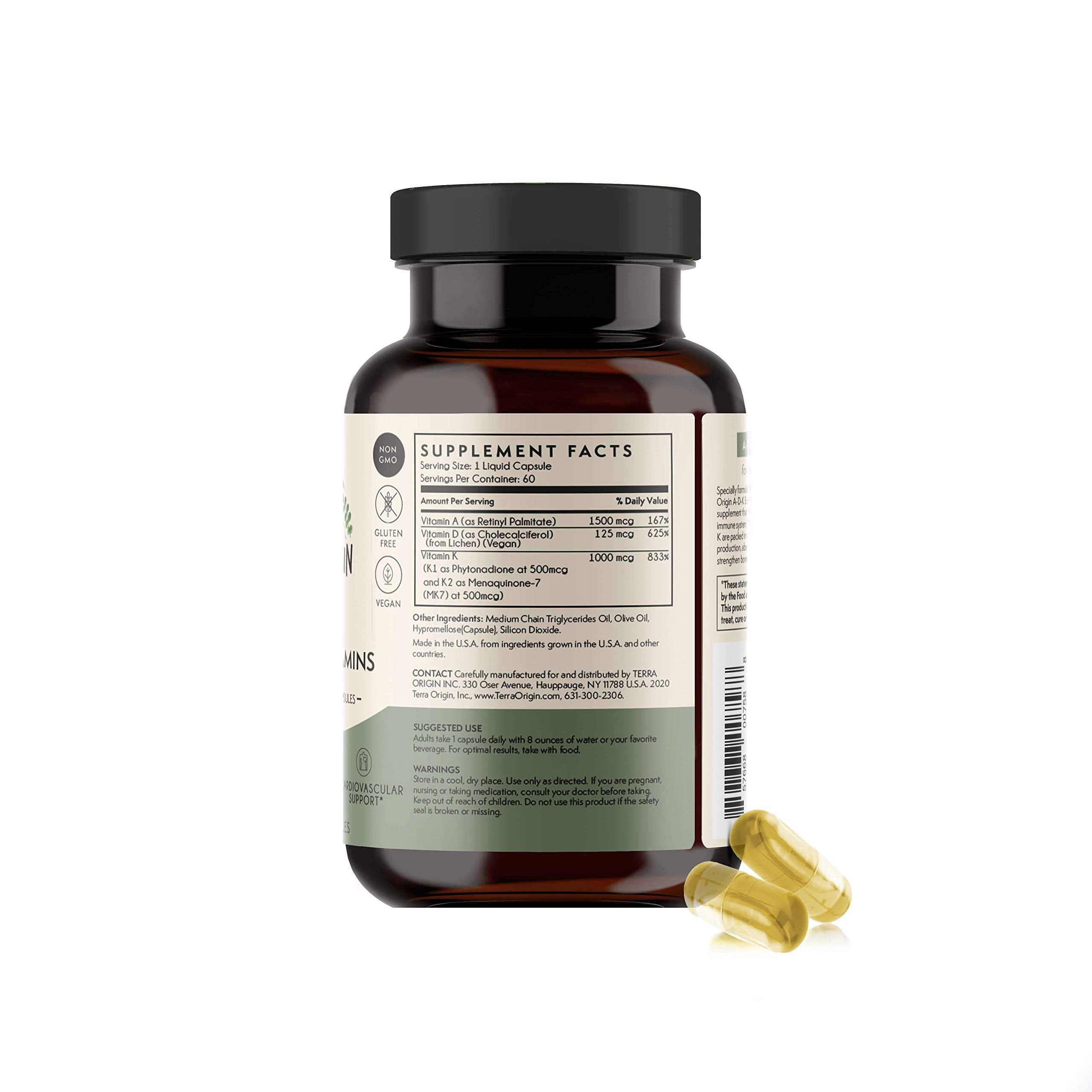 Holding Terra Origin ADK bottle for daily wellness routine