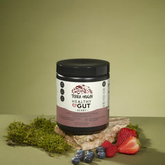 Terra Origin scoop beside berry-flavored powder for easy daily dosing