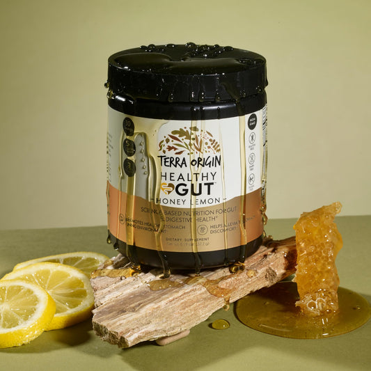 Terra Origin Healthy Gut Powder tub and spoon for easy daily use