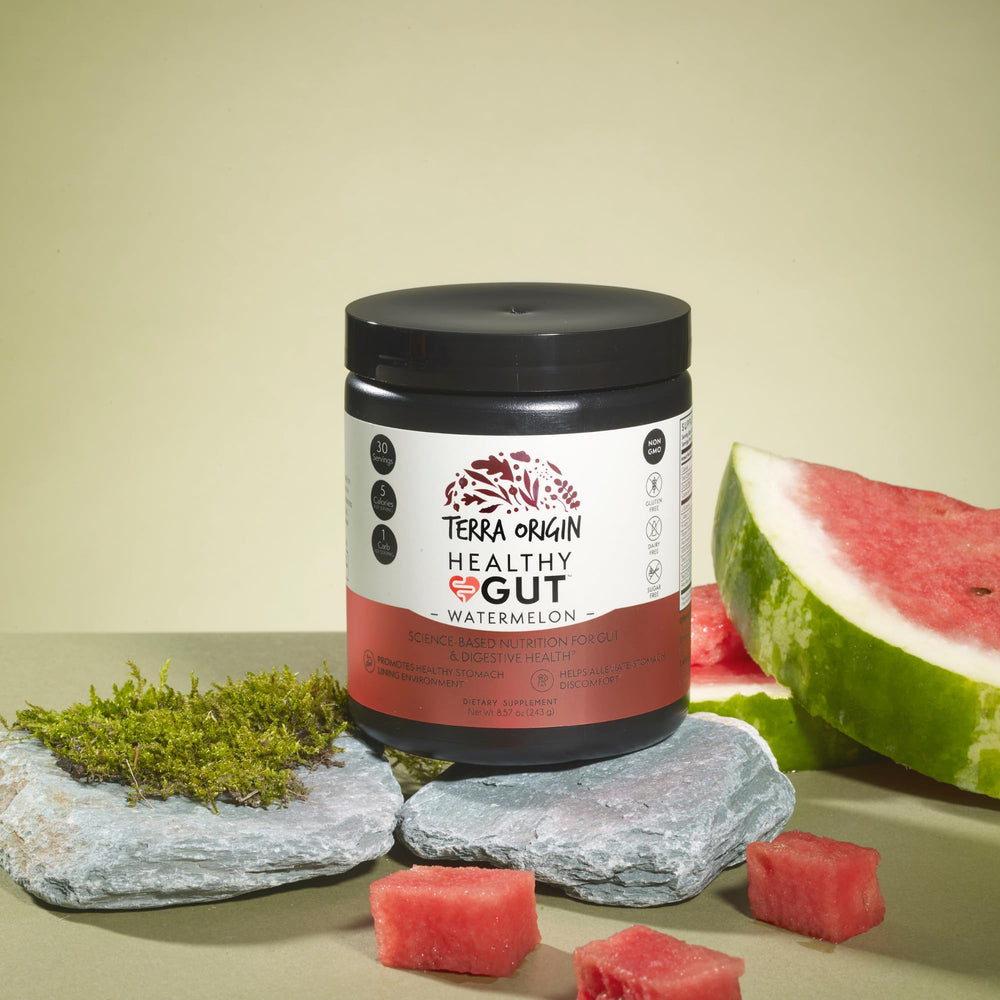 Terra Origin Healthy Gut Watermelon bottle being poured for daily use.