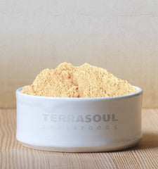 Terrasoul maca powder jar label closeup highlights organic certifications.