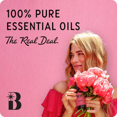 The Best Essential Oil Co Oud dropper pouring for easy diffusion and spa use.