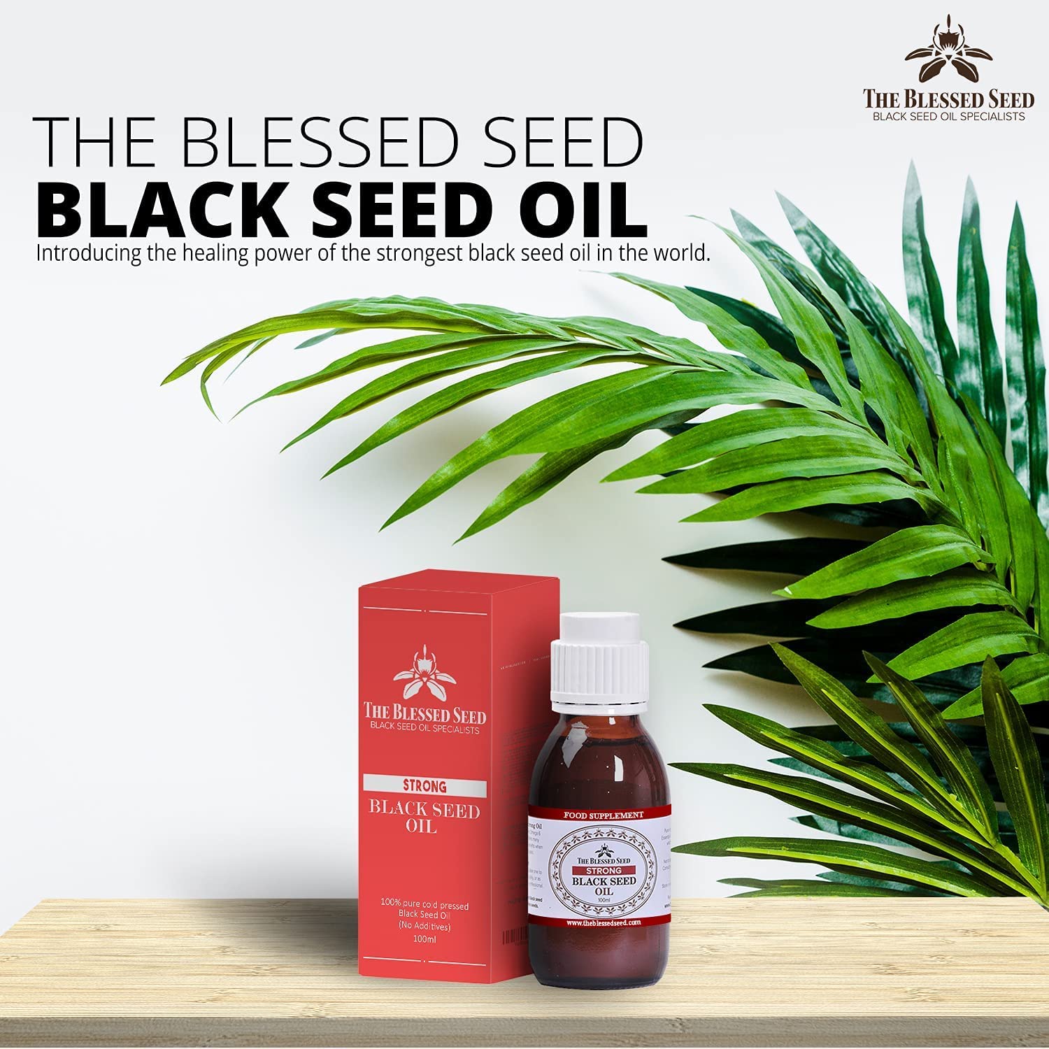 The Blessed Seed oil pour spout image, convenient dispensing without mess.