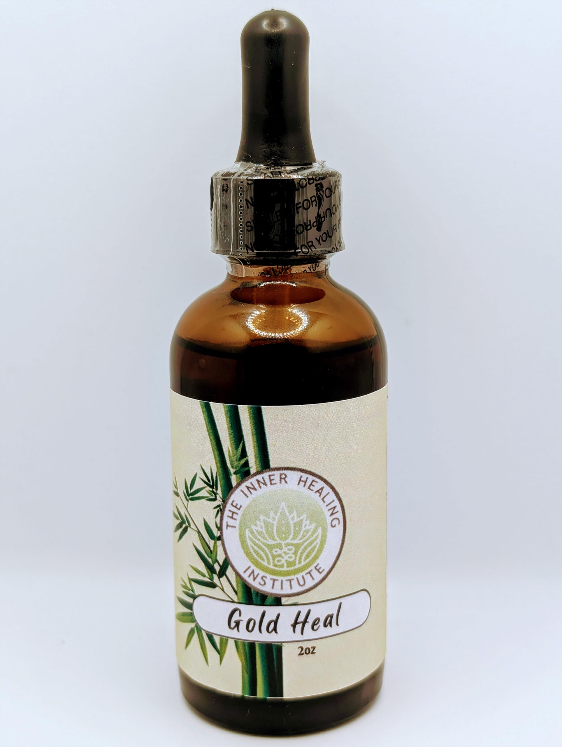 The Inner Healing Institute Gold Heal bottle label showing a premium herbal blend for gentle infection support.