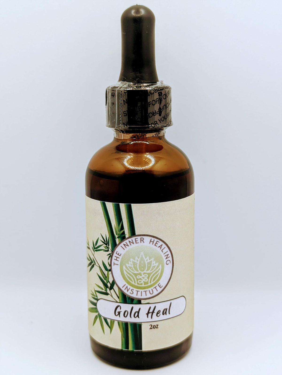 The Inner Healing Institute Gold Heal bottle label showing a premium herbal blend for gentle infection support.