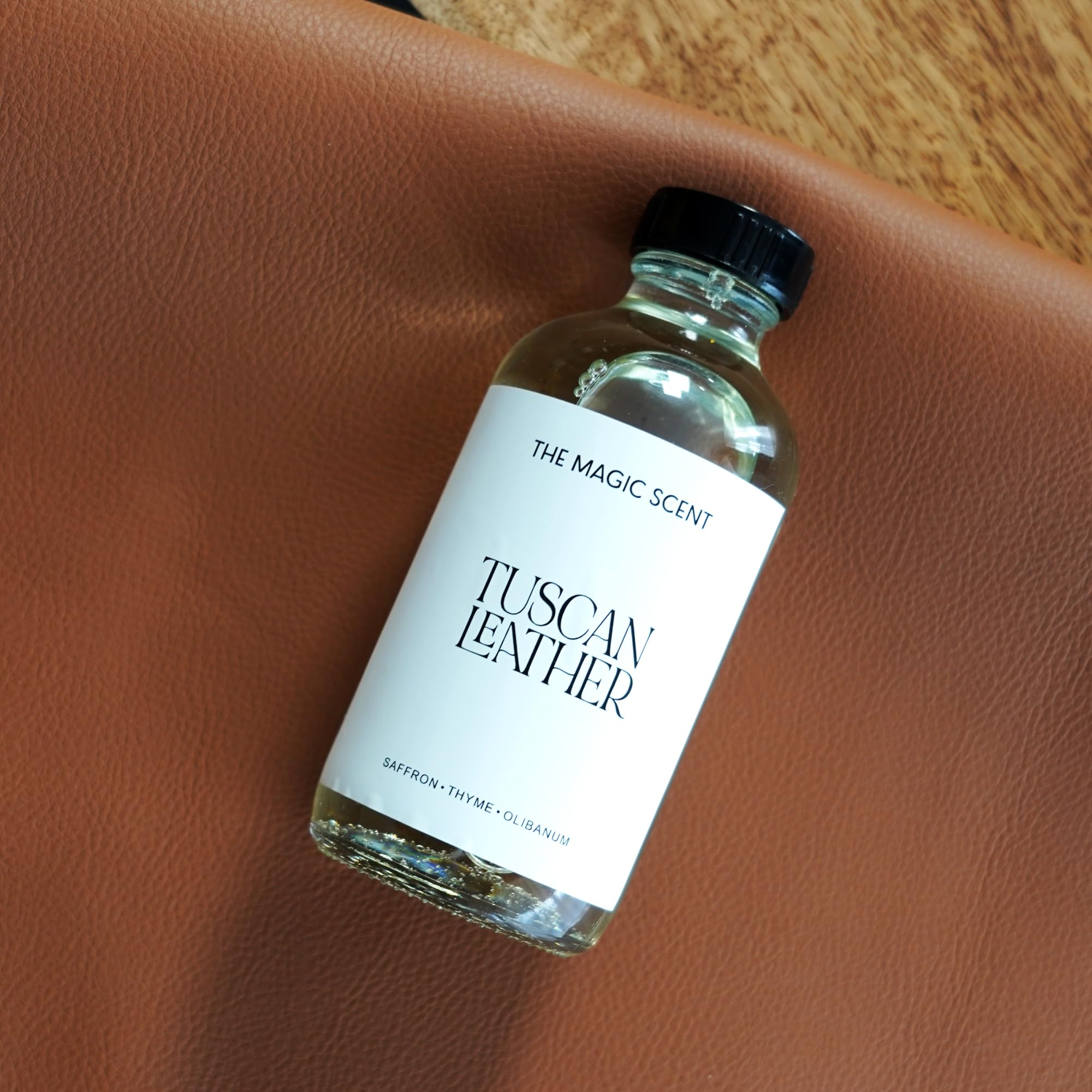Close-up of leather and jasmine notes on The Magic Scent Tuscan Leather