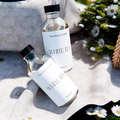 Shelf-display ready bottle of The Magic Scent White Tea Diffuser Oil.
